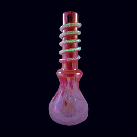 A pink glass pipe with green and red swirls.